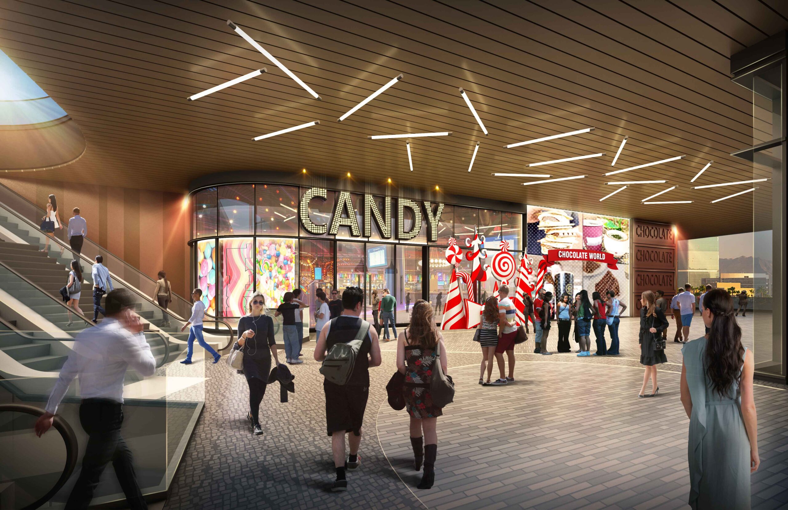 An image showing people walking around the second level terrace, in front of a large candy store, next to escalators going up.