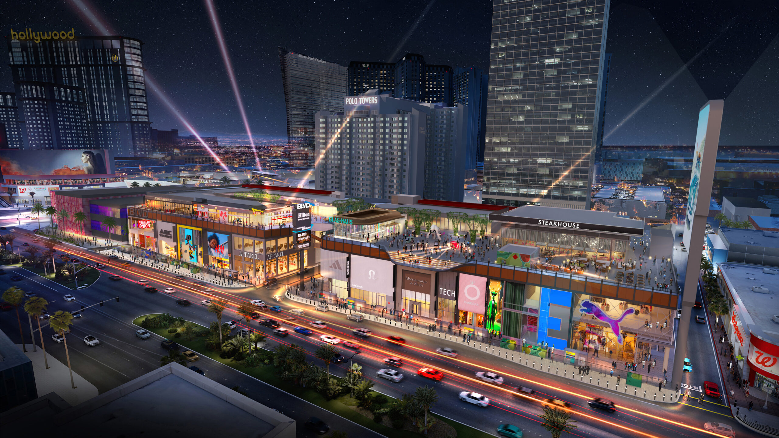 Aerial view of a vibrant shopping and entertainment complex on the Las Vegas Strip, featuring brands like Puma and Lululemon